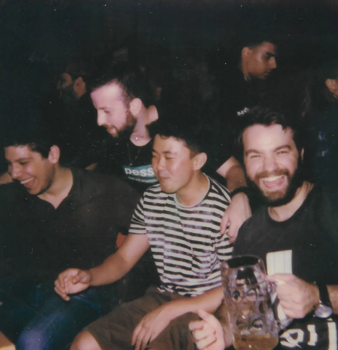 Members at a bar during a club night