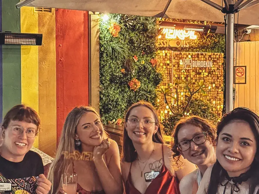 A mixed group of Gay Social Club members together at an event